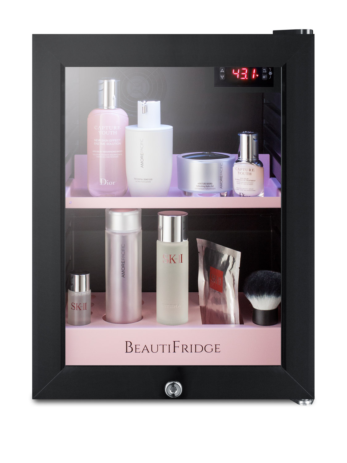 BeautiFridge compact cosmetics cooler with glass door, black cabinet, lock, matte blush pink shelves, and digital controls set for the storage of beauty products